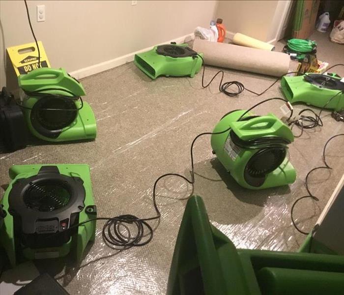 SERVPRO water equipment on the floor of a home. 