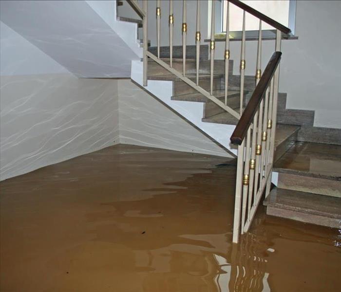water under stairway of home