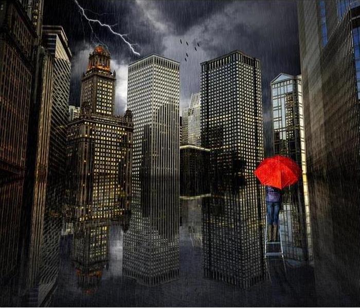 red umbrella stormy weather tall buildings